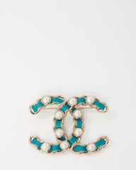 Chanel Silver Metal and Turquoise Blue Leather and Pearl Interwoven CC Logo Brooch